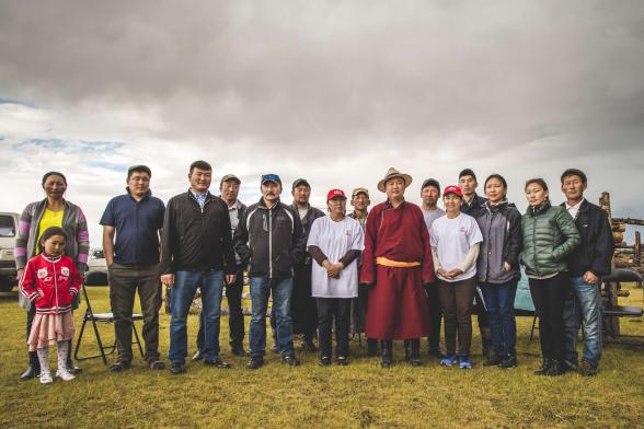A large group of people posing for a group photo.