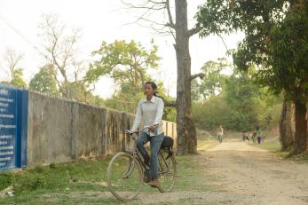 Sarmila riding a bike