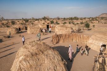 Sparse thatched huts–makeshift, temporary homes–dot the al-hilu camp for displaced people in tongoli