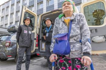 A person attending a hygiene kit distribution by mercy corps ukraine parter organization pomogaem charitable trust.
