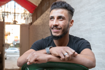 A person sitting in a chair.